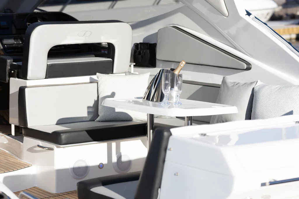 Cockpit table set with champagne on the Schaefer 375 HT
