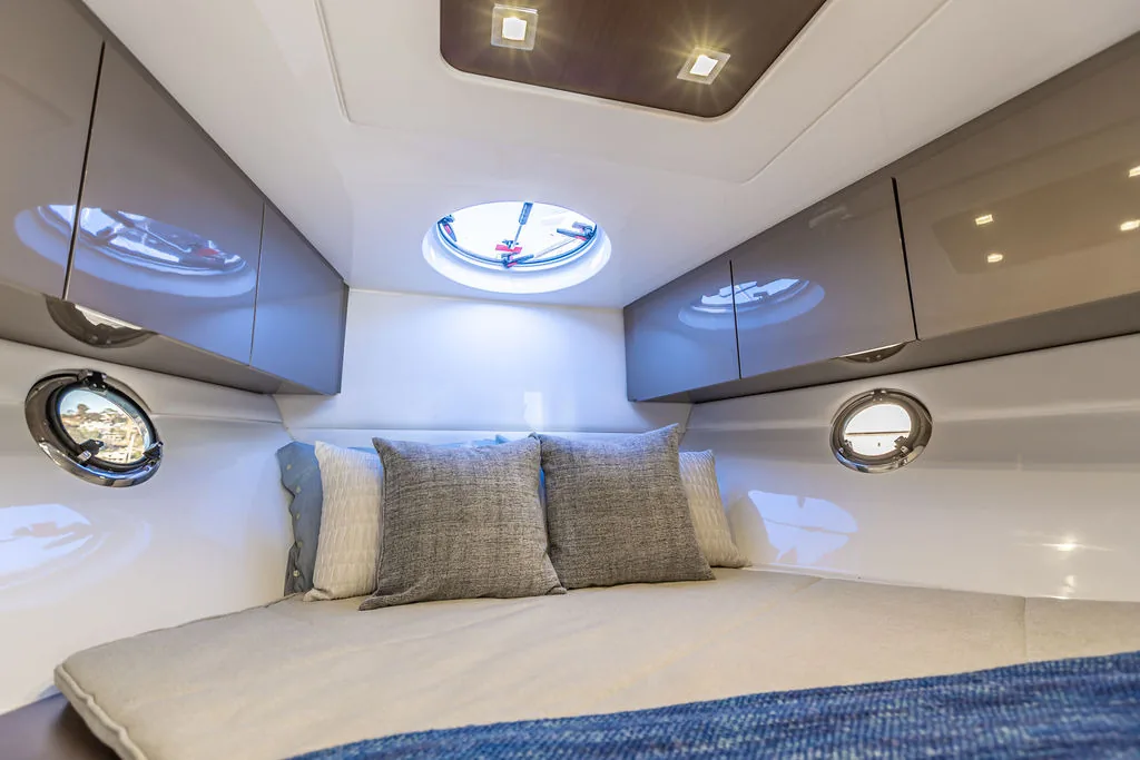 Forward cabin of the Schaefer 375 HT with skylight and portholes