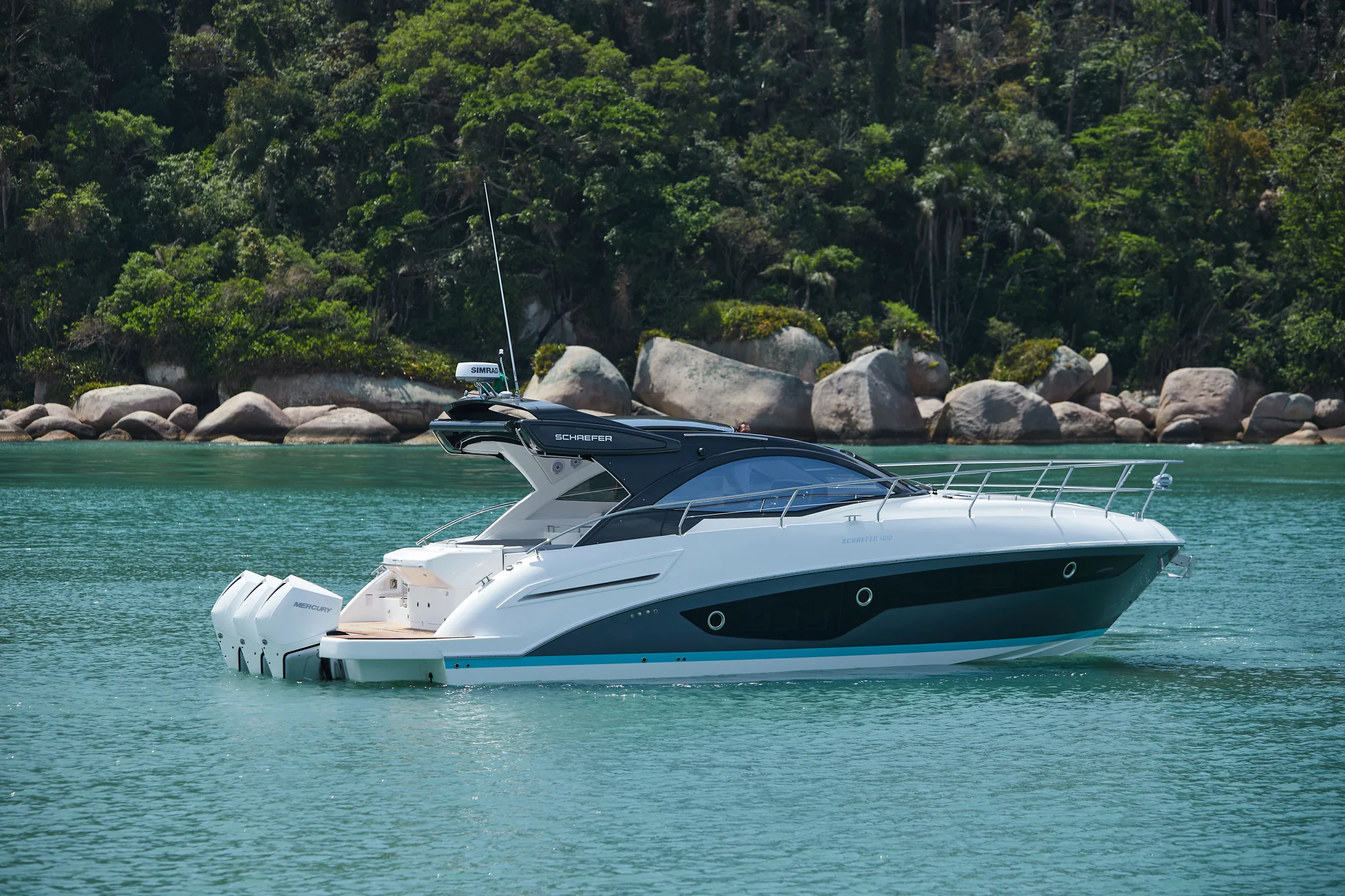 Schaefer 400 at anchor off a sandy cove