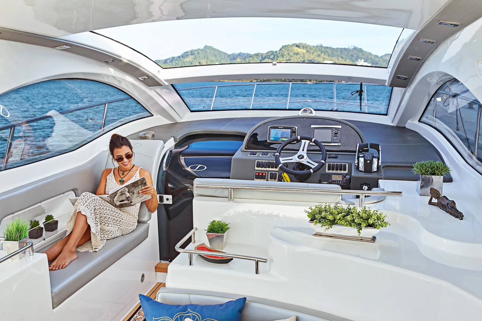 Guest relaxing on the cockpit lounge of the Schaefer 400