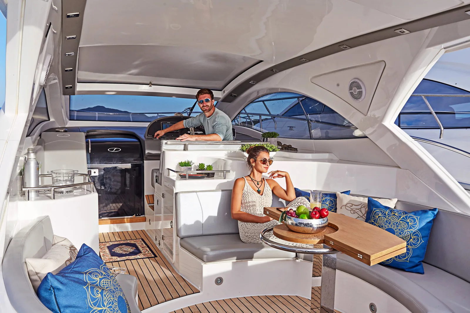 Guests around the cockpit galley and table of the Schaefer 400
