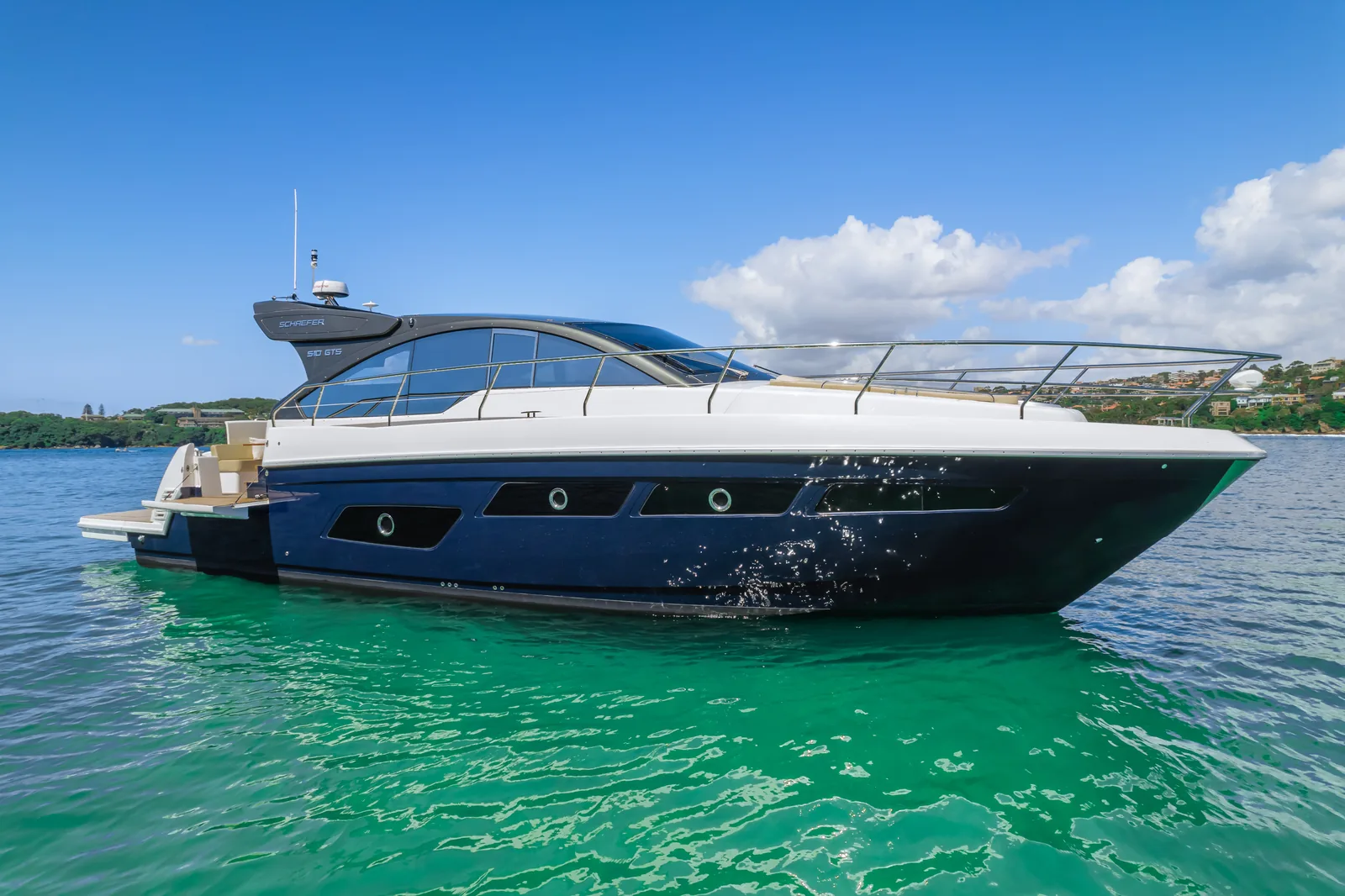 Schaefer 510 GTS at speed, stern quarter view