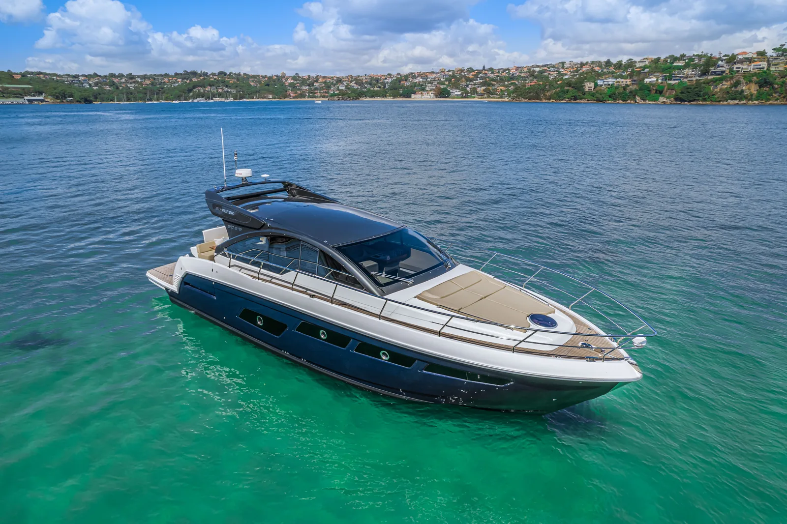 Schaefer 510 GTS at anchor off a Sydney Harbour beach