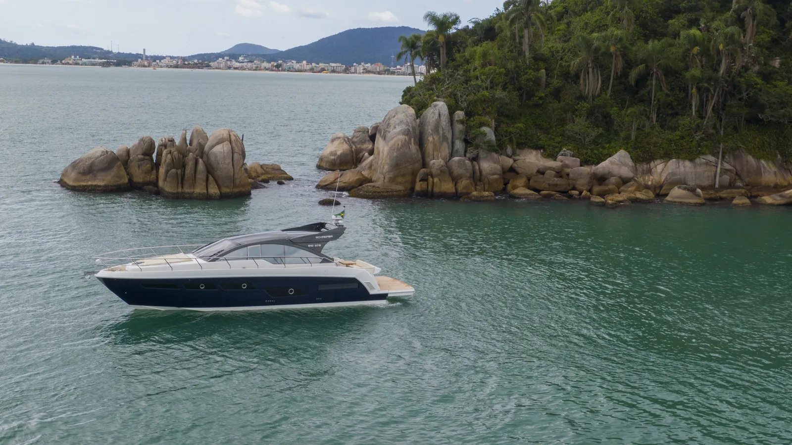 Schaefer 510 GTS at anchor off a rocky island