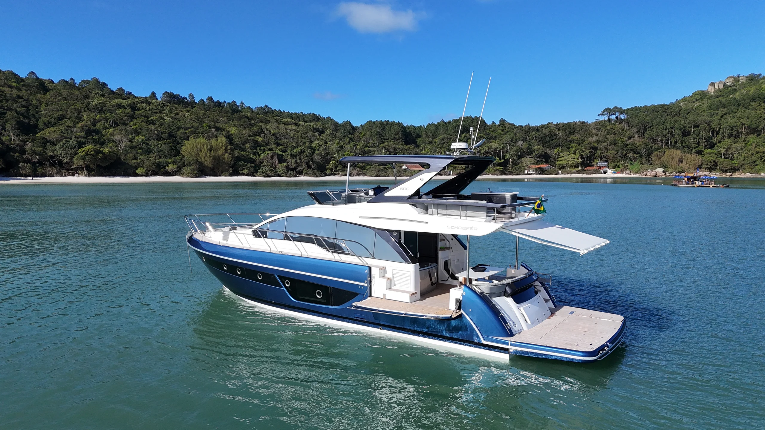 Schaefer 600 cruising off a beach