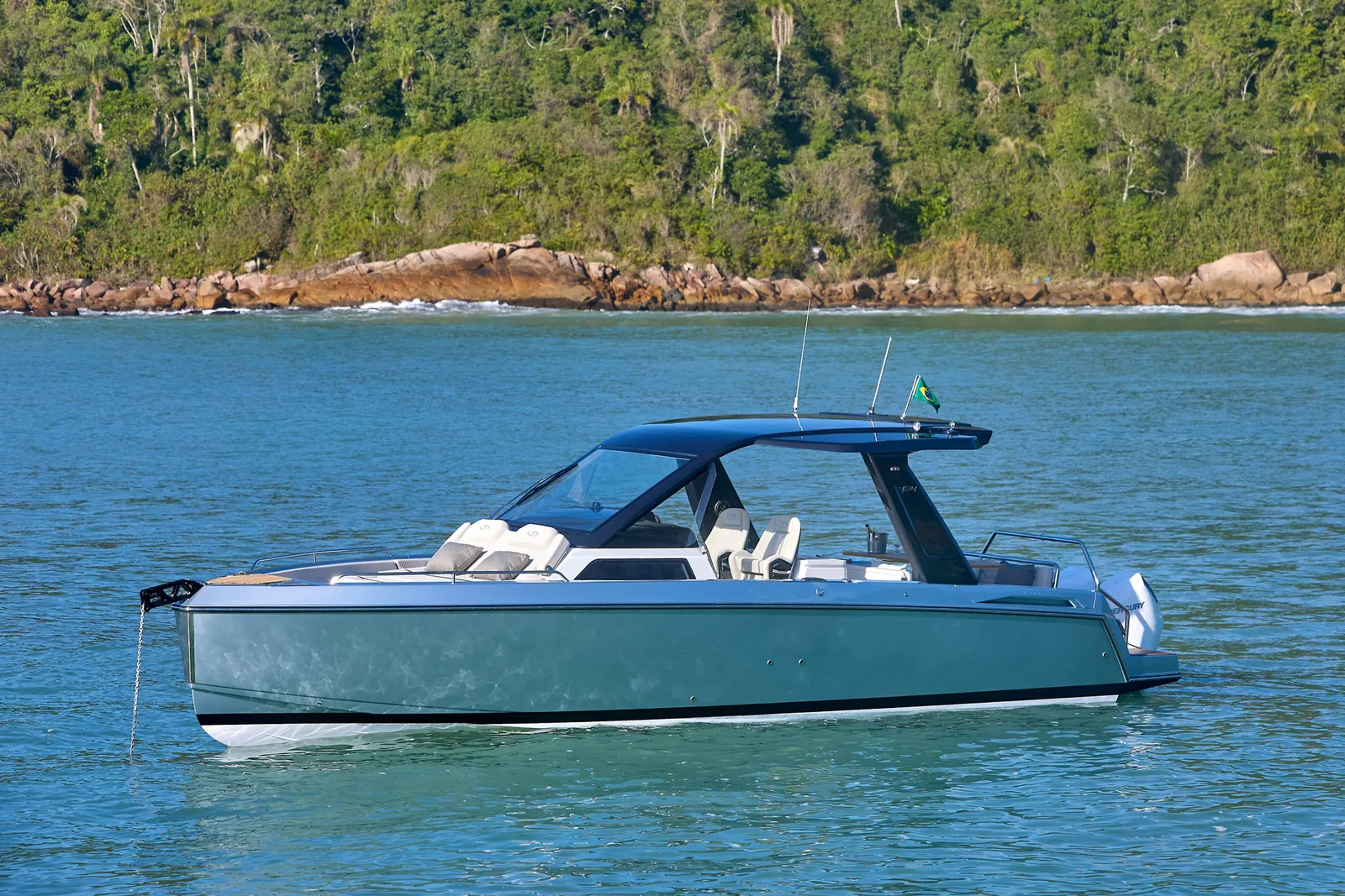 Schaefer V34 at anchor in a sheltered bay, side profile