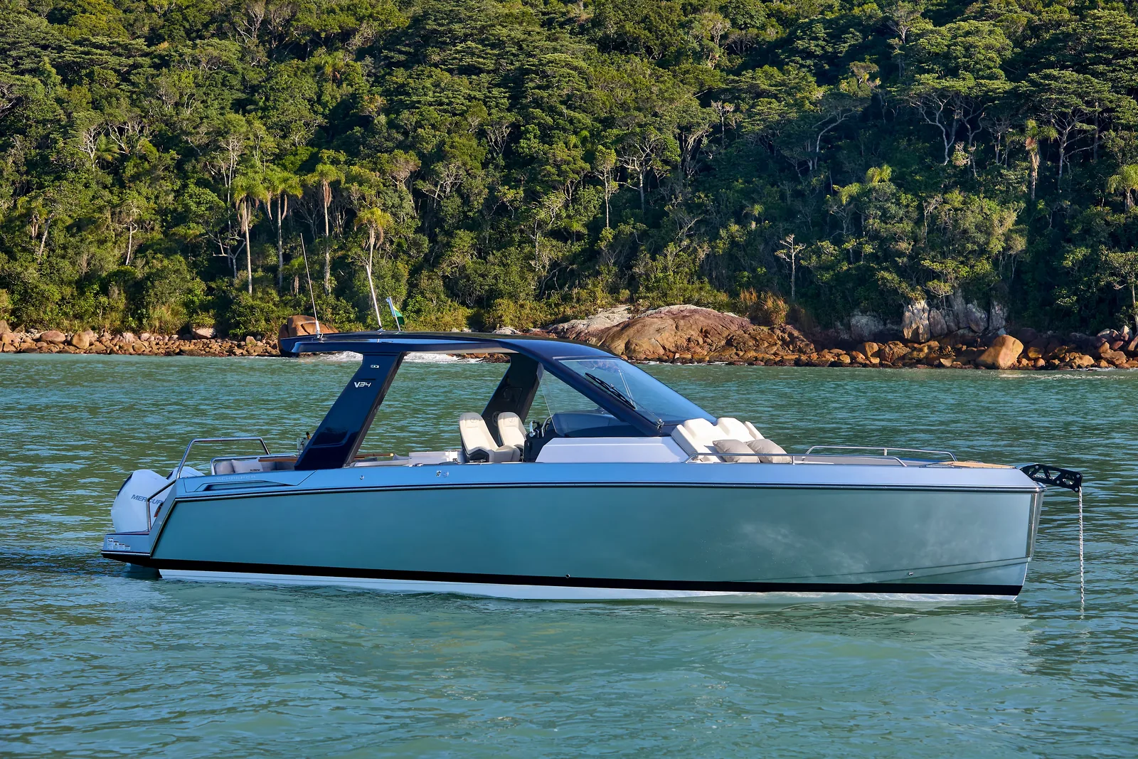 Schaefer V34 at rest with a forested shoreline behind