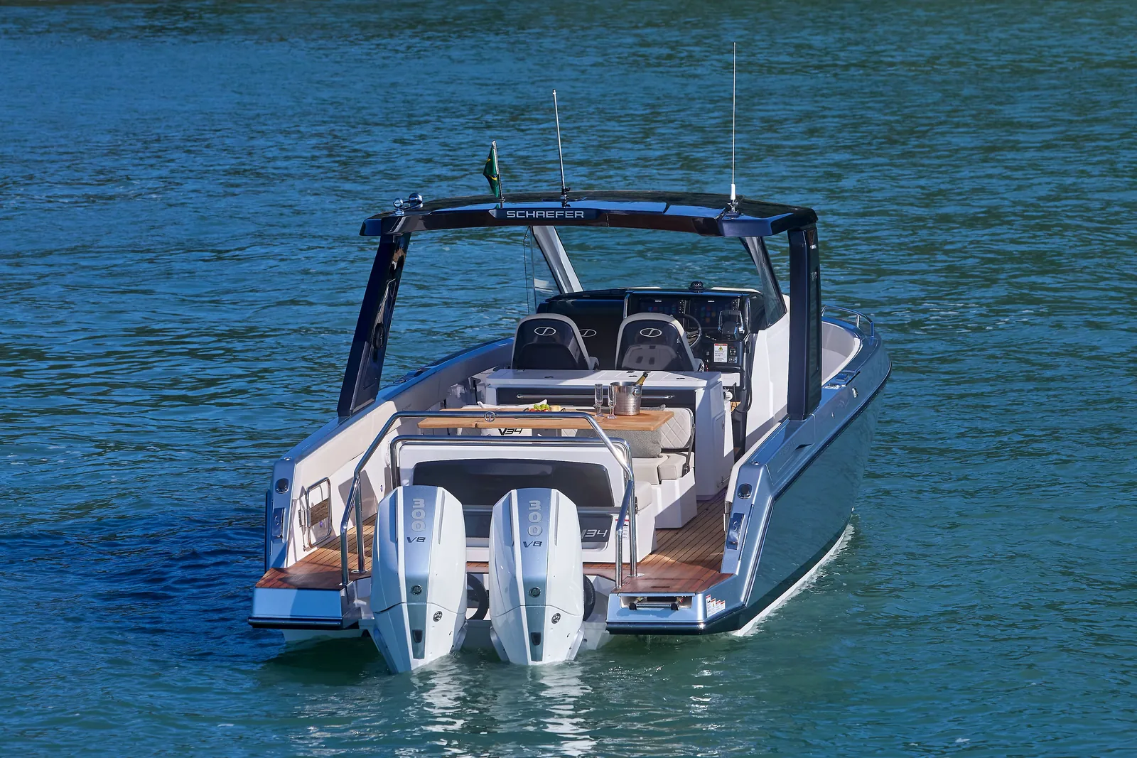 Stern view of the Schaefer V34 with twin Mercury Verado outboards