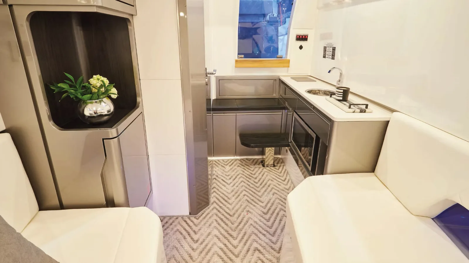 Cabin entrance and galley area below deck on the Schaefer V34