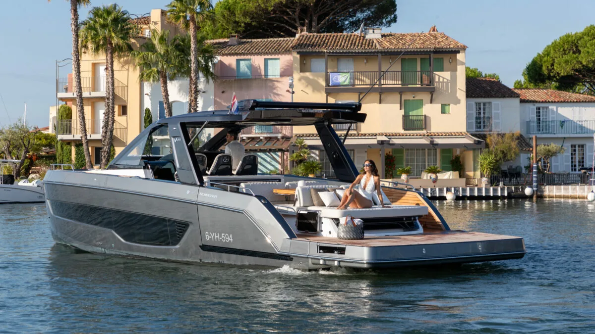 Schaefer V44 moored in front of waterfront villas