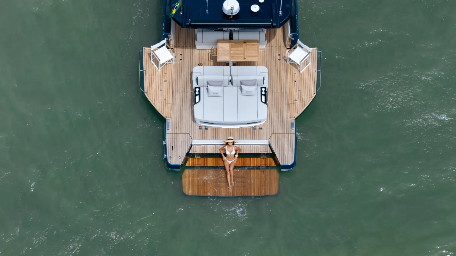 Schaefer V44 from directly above with the aft sun lounge and swim platform in the water
